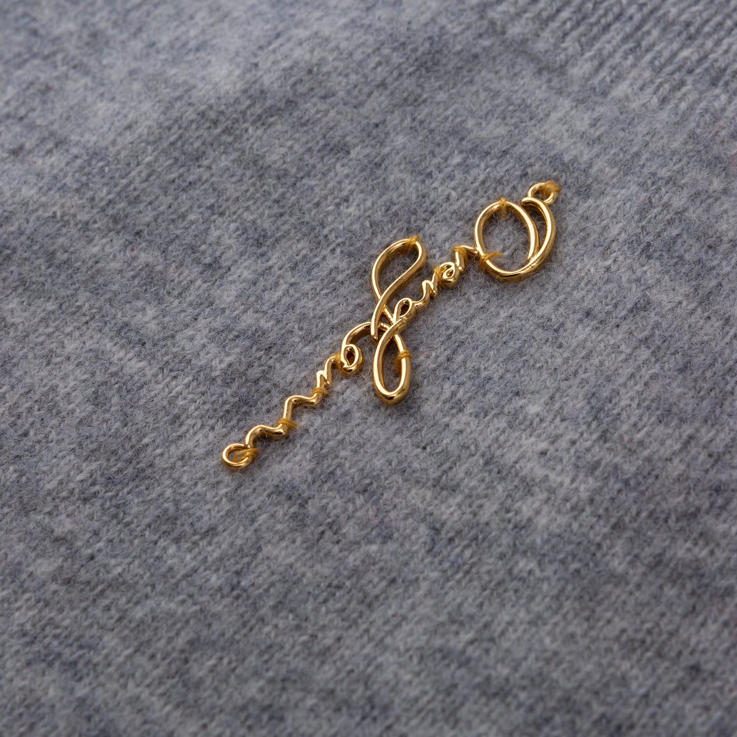 Sleeveless Jumper with Golden Metal Logo