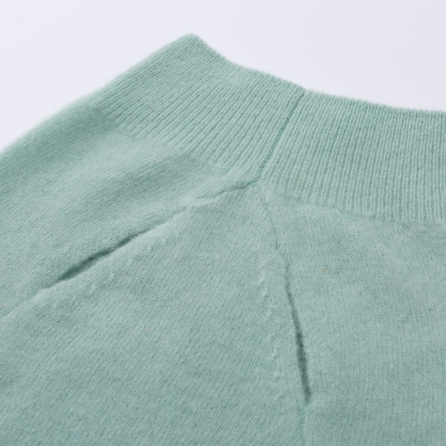 Sleeveless Jumper with Golden Metal Logo